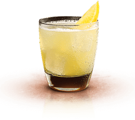 alt-yellow cocktail with a slice of lime